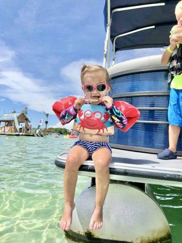 Kid enjoying a snack at Crab Island